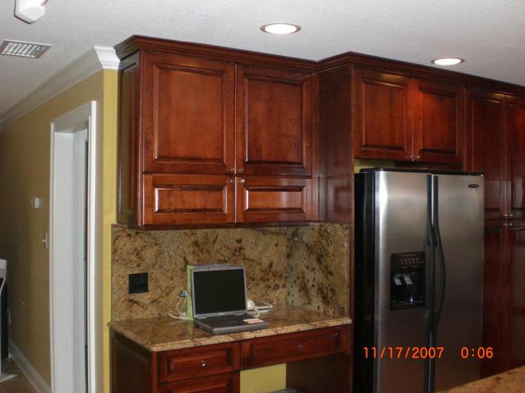 Kitchen remodel in New Luxury Home with Island, Sink, Granite, Quartz, Tile, Cabinets, and Hardwood Floors